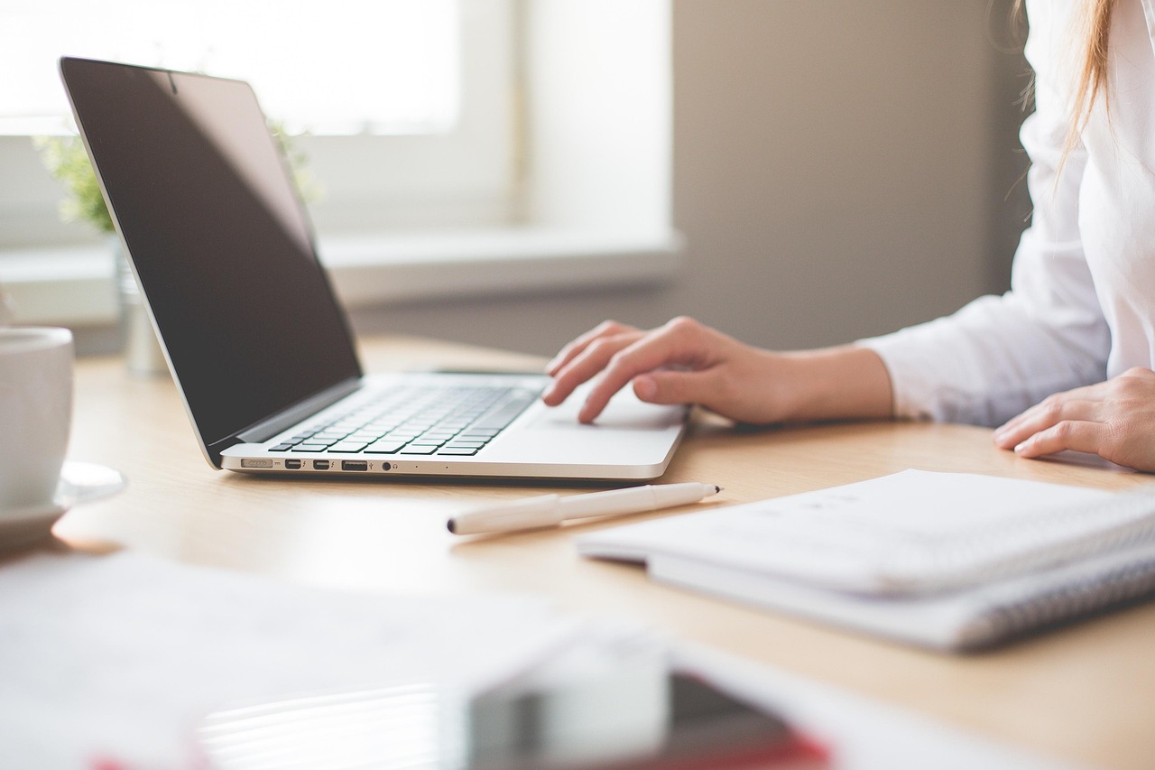 Professional working from a furnished apartment in Montreal during a corporate relocation